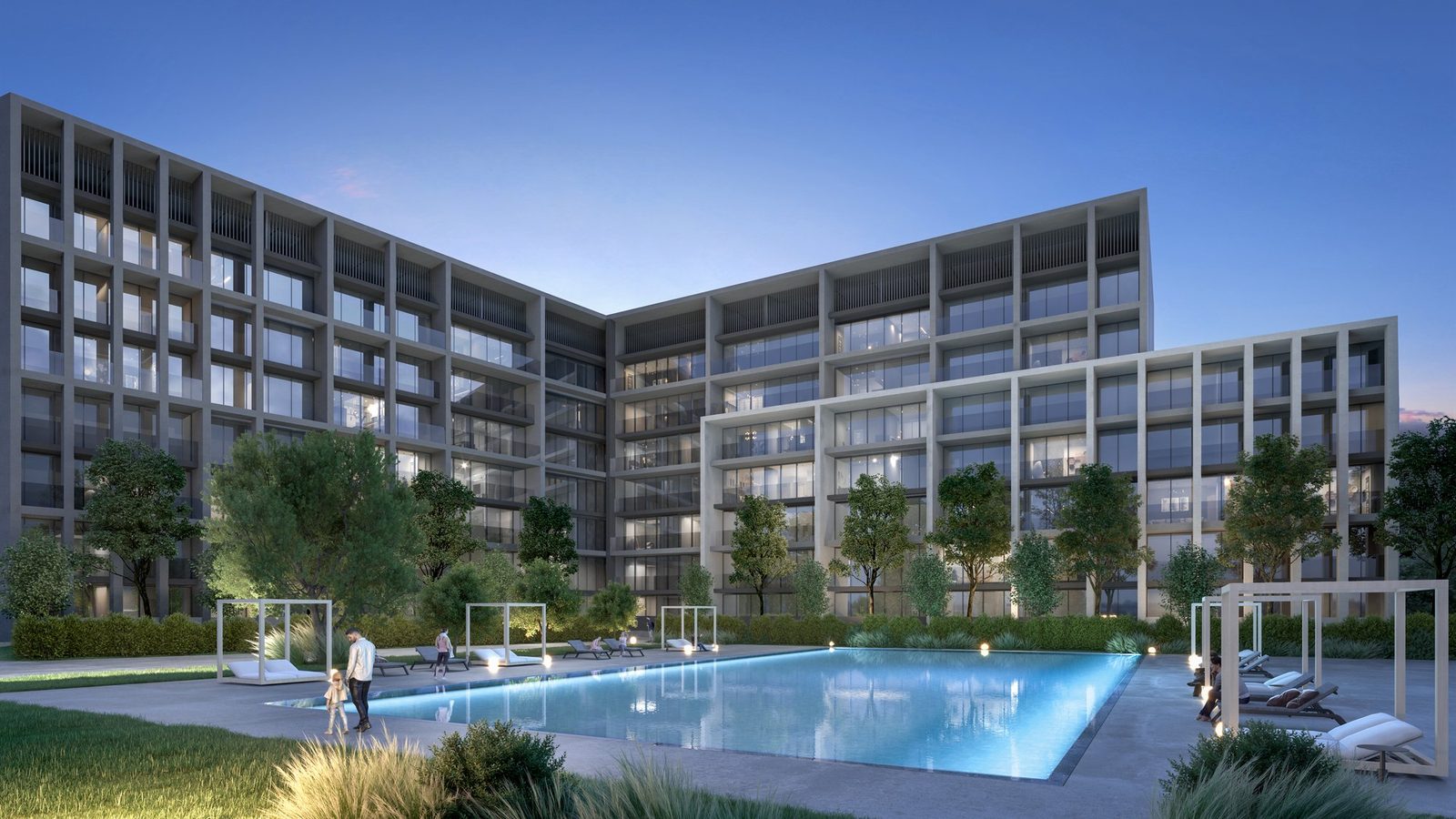 Aljada, Sharjah: an apartment building's pool and courtyard at dusk (Arada's render)