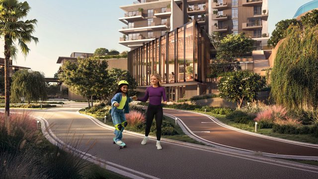 Rise by Athlon in Dubailand, the towers beside the running track (Aldar's render)